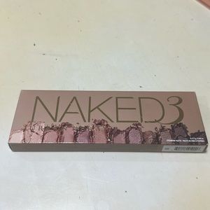 Urban Decay Naked 3 eye shadow palette.